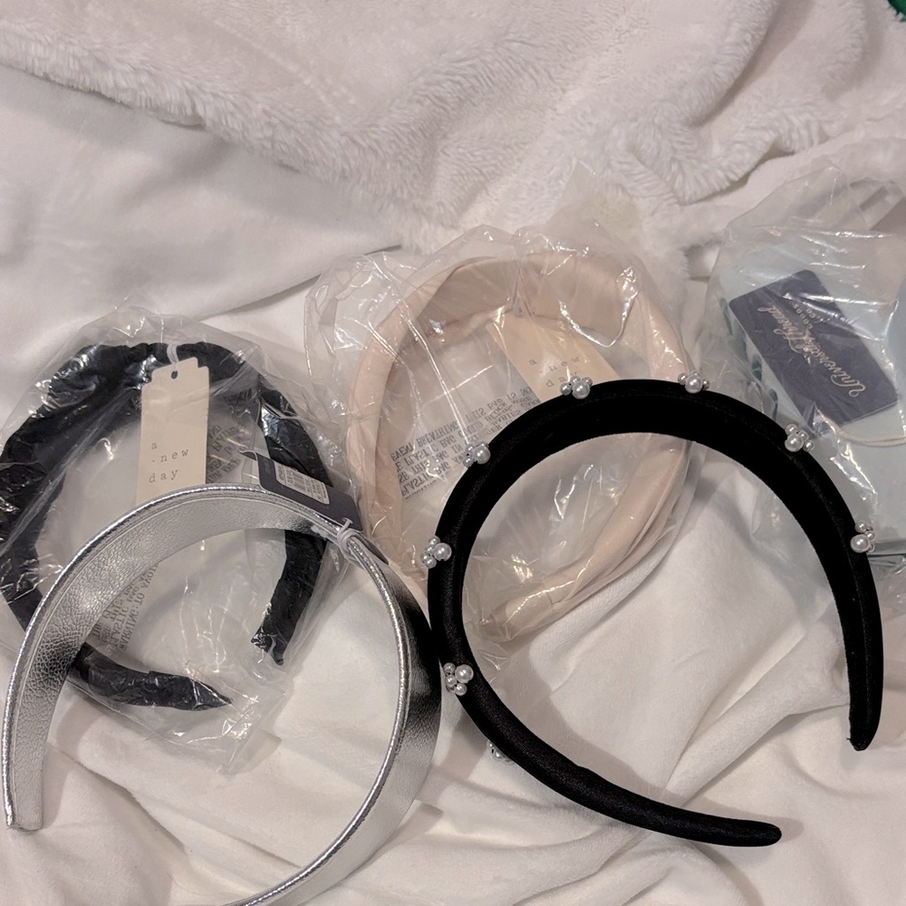 NWT Black, Silver, and Cream Headbands and teal clip. All brand new with tags.